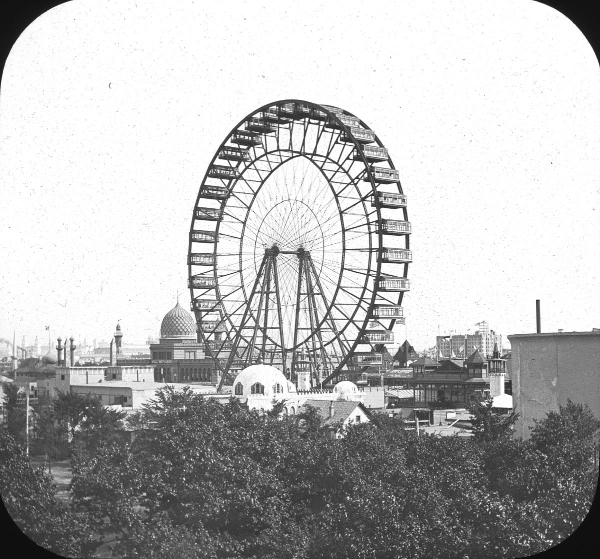 The original Ferris Wheel rising above the buildings of the 1893 World's Columbian Exposition in Chicago